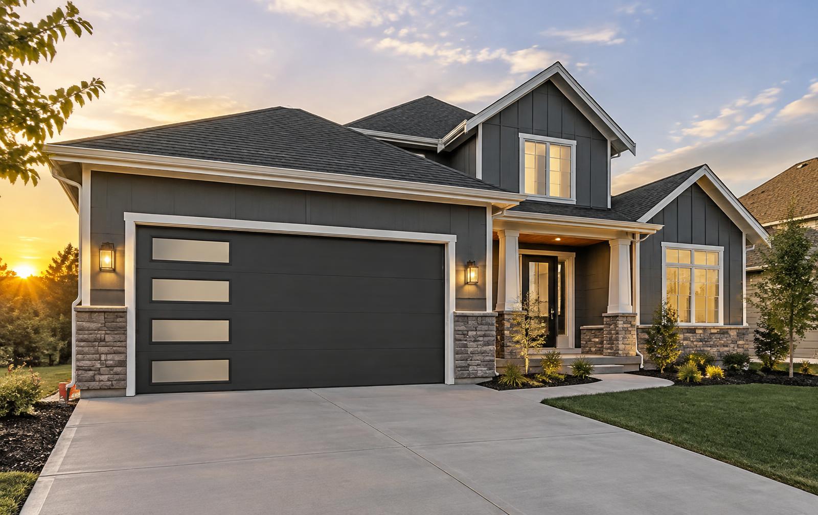 Modern home with a new black garage door
